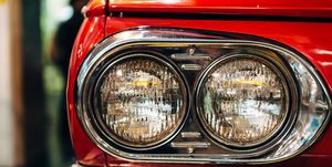 red vintage car headlights