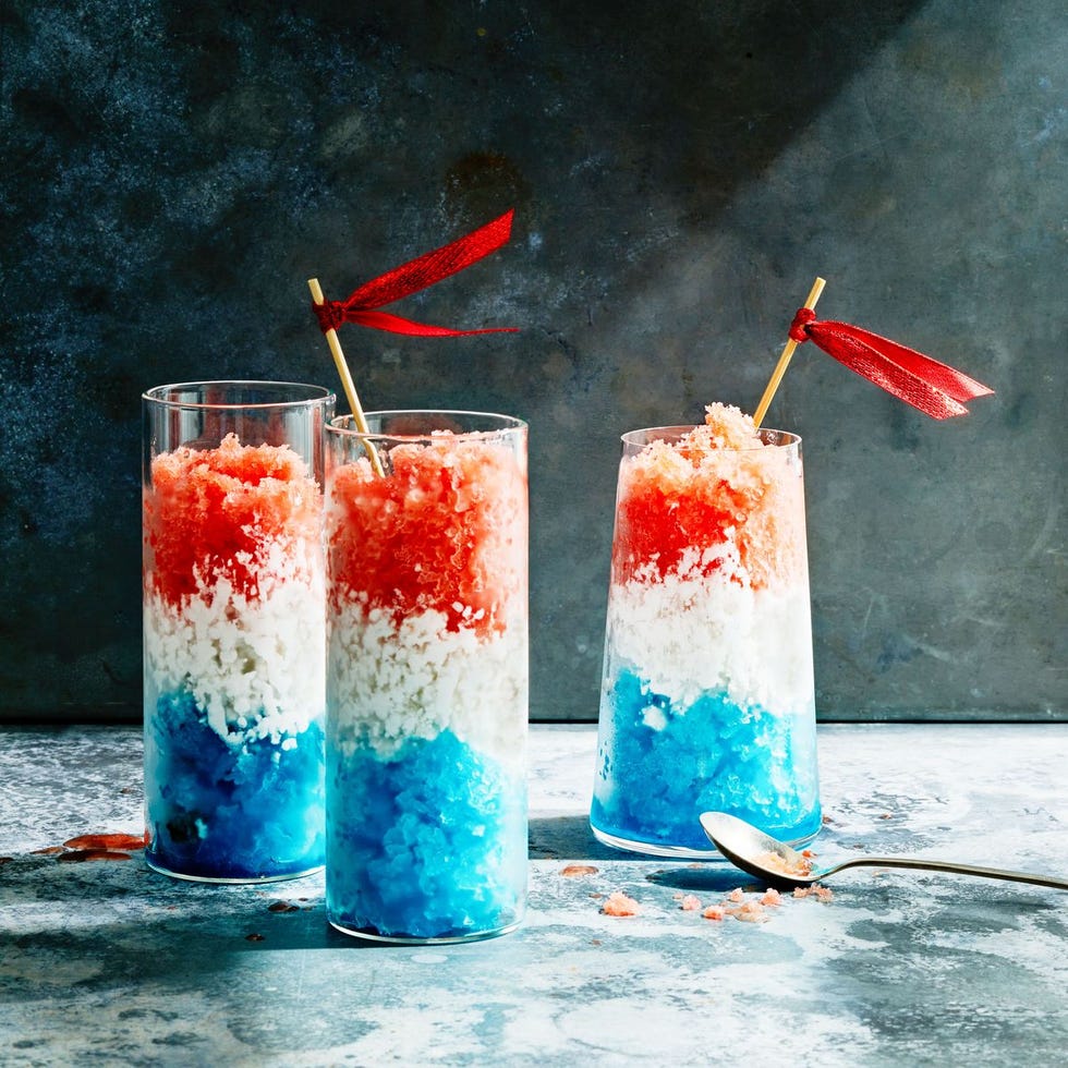 red white and blue granitas in a clear glass