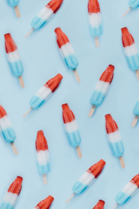 red, white, and blue popsicles on a blue background