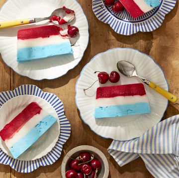 slices of red, white, and blue sorbet loaf on small plates