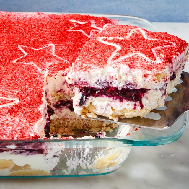 ladyfingers layered with mascarpone, blueberry jam, and strawberries