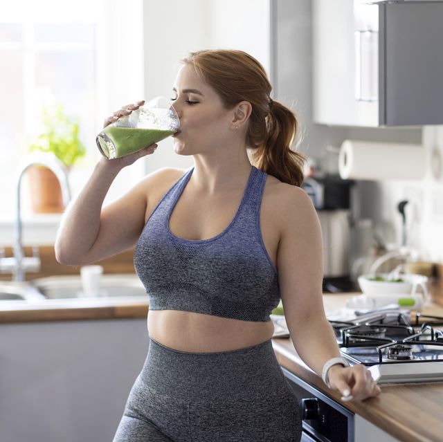 https://hips.hearstapps.com/hmg-prod/images/redhead-woman-drinking-healthy-milkshake-after-royalty-free-image-1640211450.jpg?crop=0.668xw:1.00xh;0.107xw,0&resize=640:*