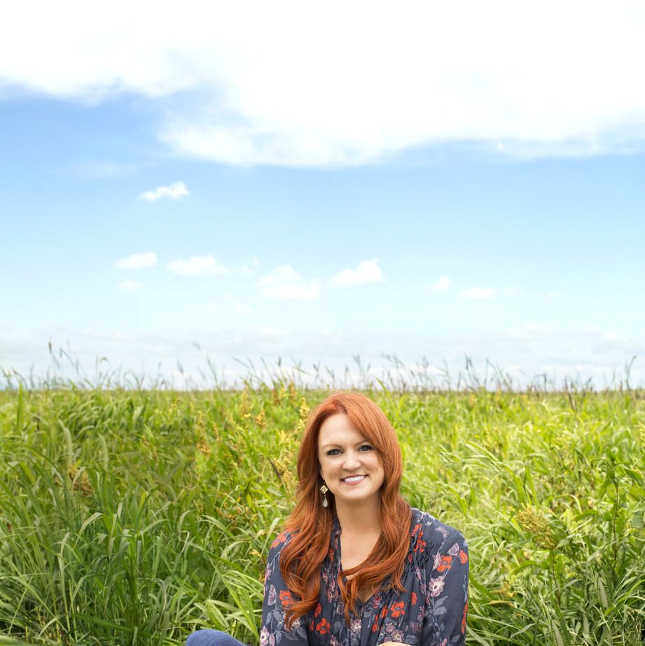 ree drummond with dog in field