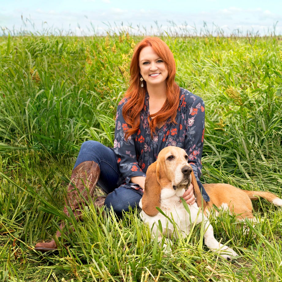 ree drummond with dog in field