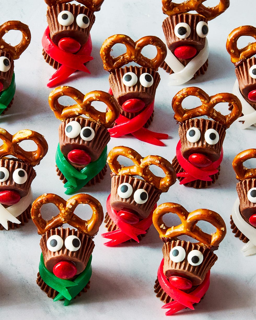 reeses candy stuck together with pretzels to make mini reindeers