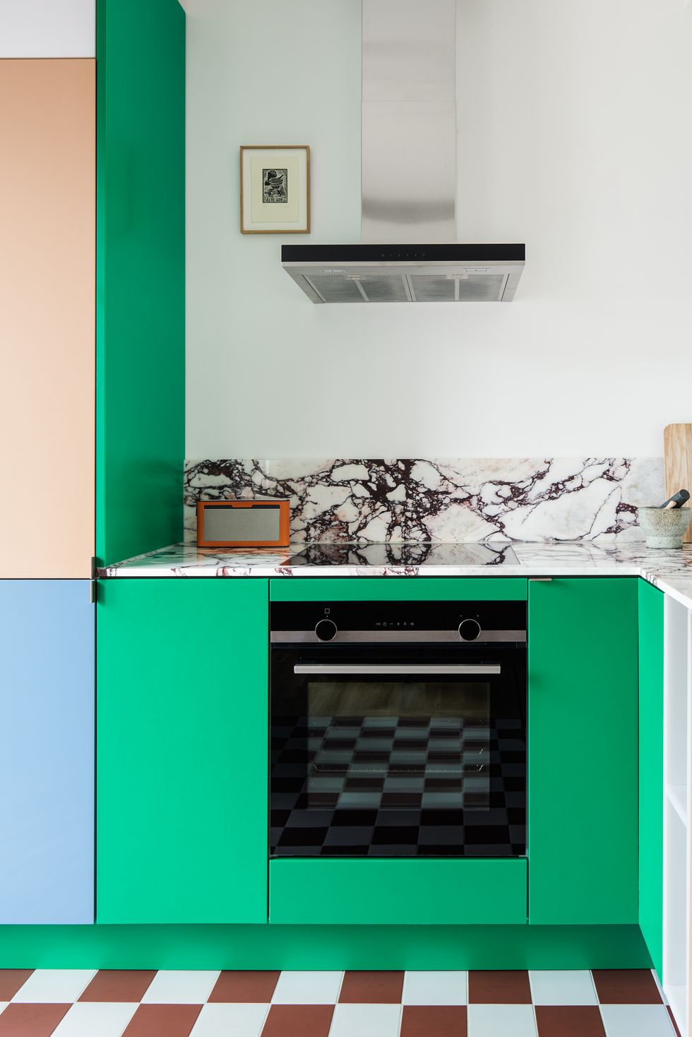 colorful cabinets with marble backsplash