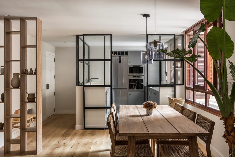 cocina abierta con cerramiento de cristal
