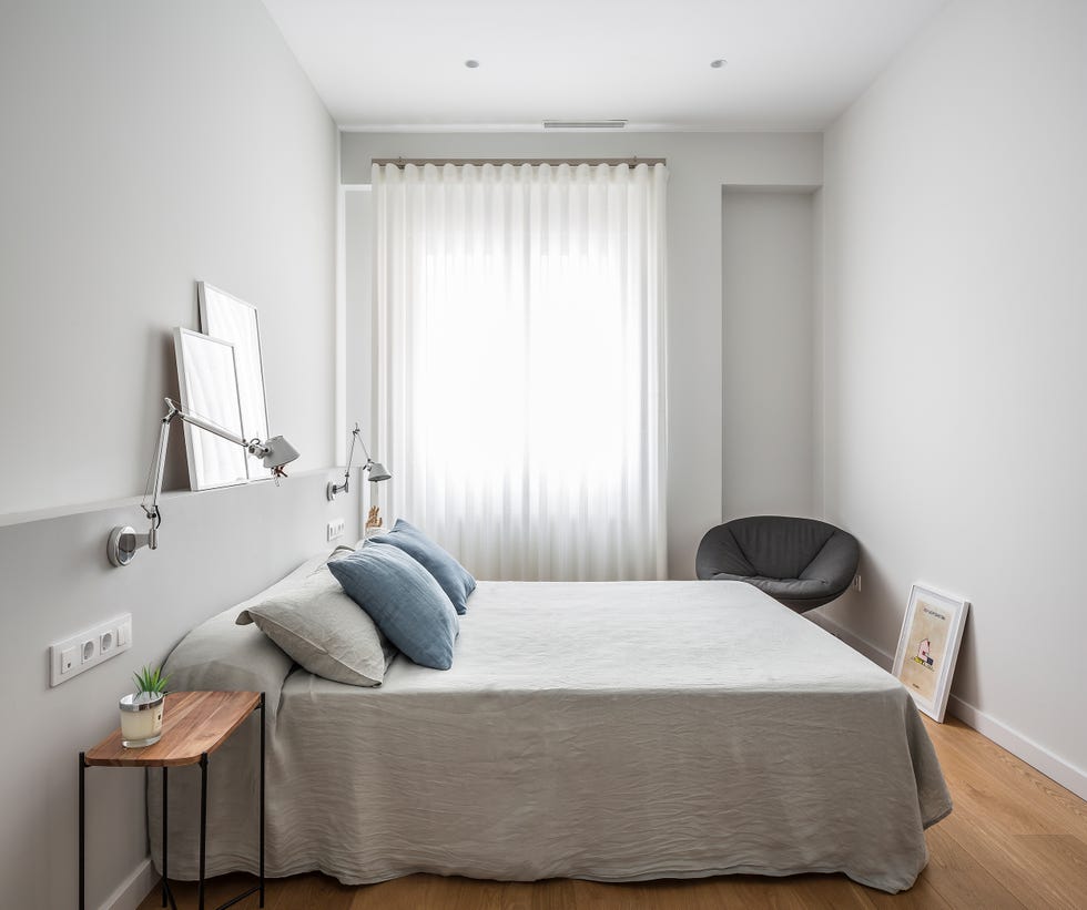 dormitorio de diseño moderno y minimalista en tonos grises