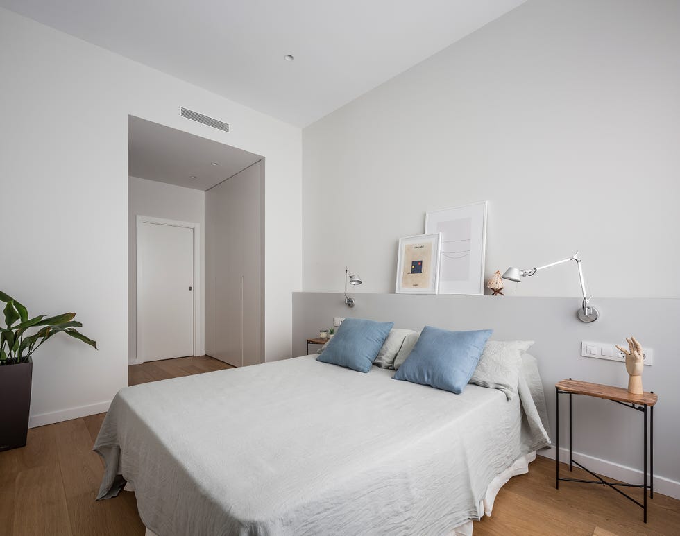 dormitorio de diseño moderno y minimalista en tonos grises