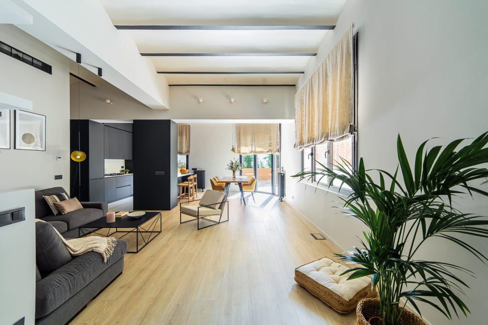 salón con cocina y comedor