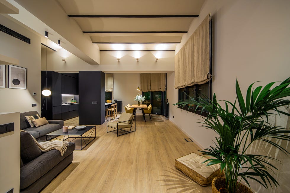 salón con cocina y comedor