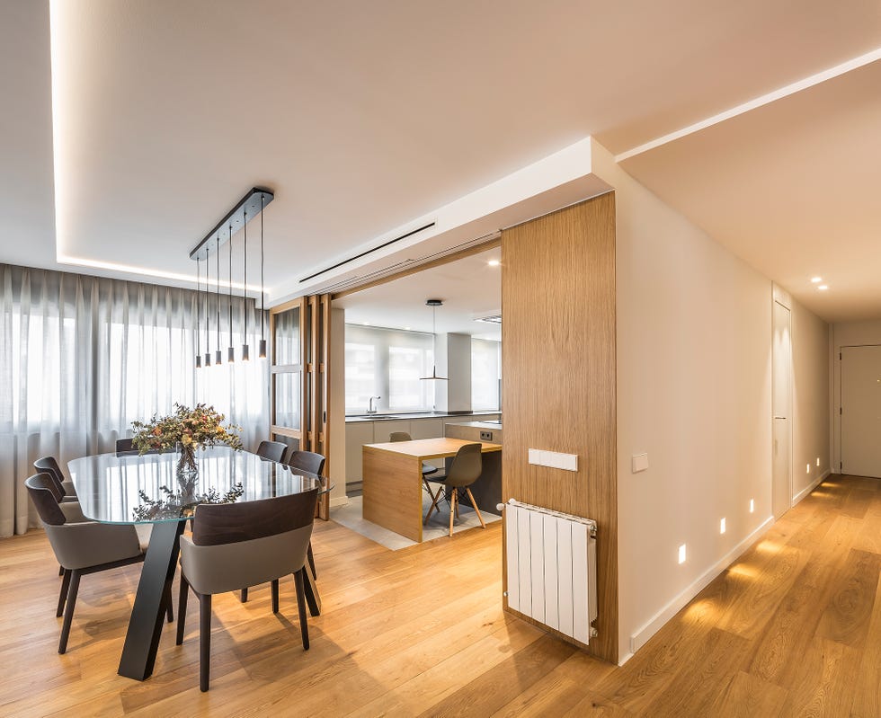 comedor de diseño contemporáneo abierto a la cocina