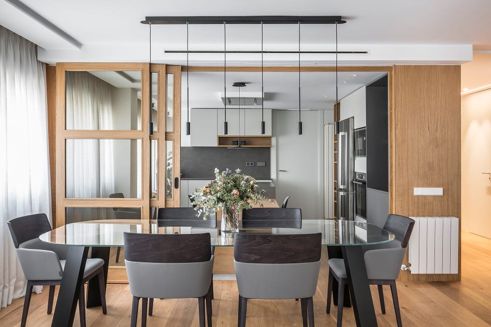 comedor de diseño contemporáneo abierto a la cocina