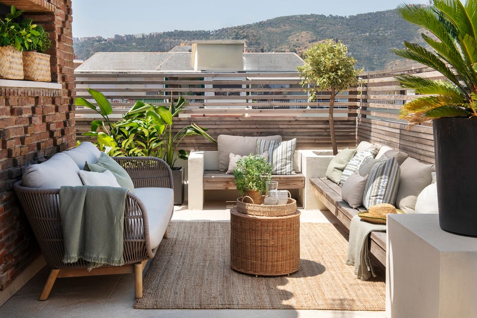 terraza con muebles de exterior