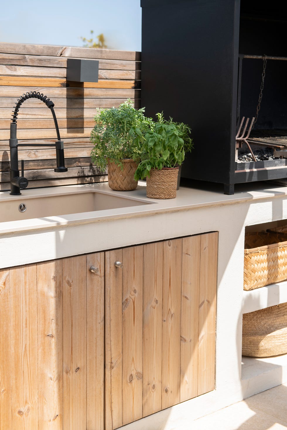 cocina exterior con barbacoa