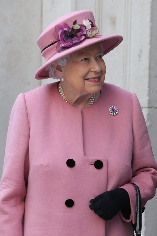 Pink, Clothing, Hat, Headgear, Outerwear, Magenta, Fashion accessory, Coat, Costume hat, Smile, 