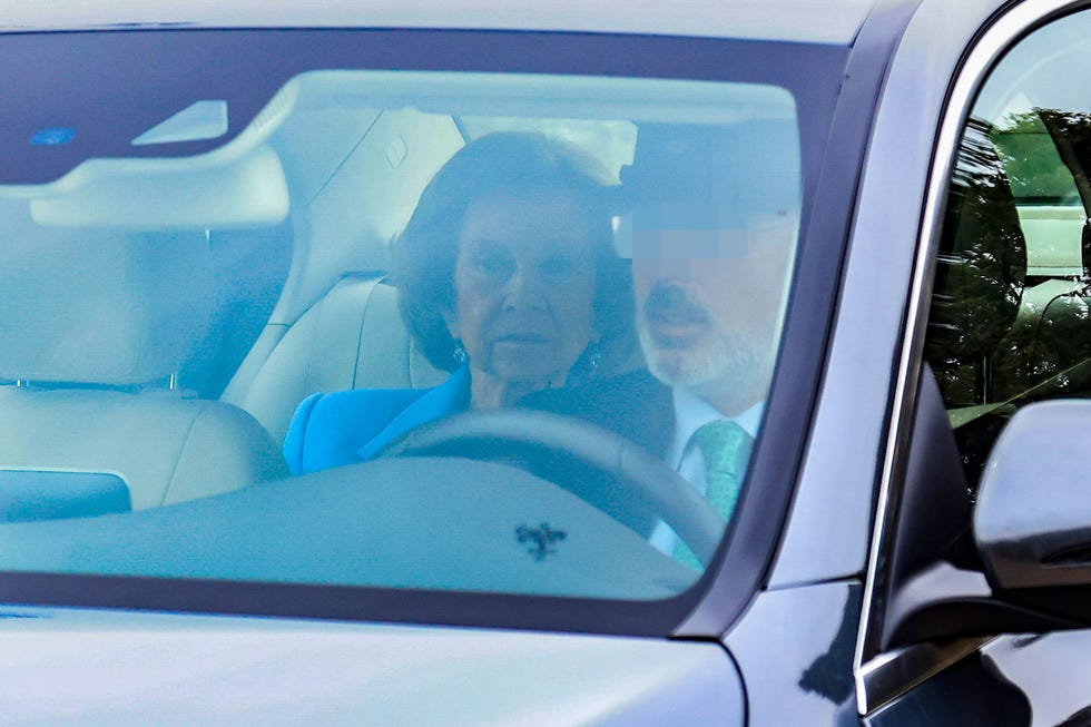 a group of people in a car