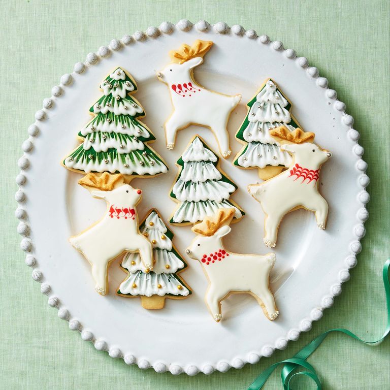 christmas sugar cookies trees reindeers decorated with royal icing