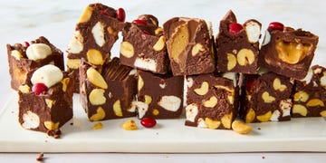 chocolate fudge with marshmallows, nuts, candy, and peanut butter cups