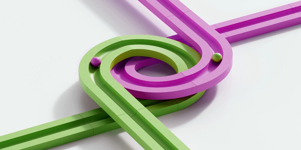 3D image of rolling objects along a infinity path. The concept of choice. digitally generated image of rolling objects that follow a set path. marble run. the concept of choice. image showing the different choices in the same time can create the different results