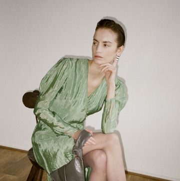a woman sitting on a chair
