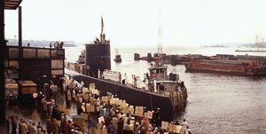 crowd welcoming home submarine crew