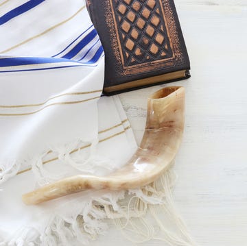 religion image of Prayer Shawl - Tallit, Prayer book and Shofar (horn) jewish religious symbols. Rosh hashanah (jewish New Year holiday), Shabbat and Yom kippur concept. religion image of prayer shawl tallit, prayer book and shofar horn jewish religious symbols rosh hashanah jewish new year holiday, shabbat and yom kippur concept