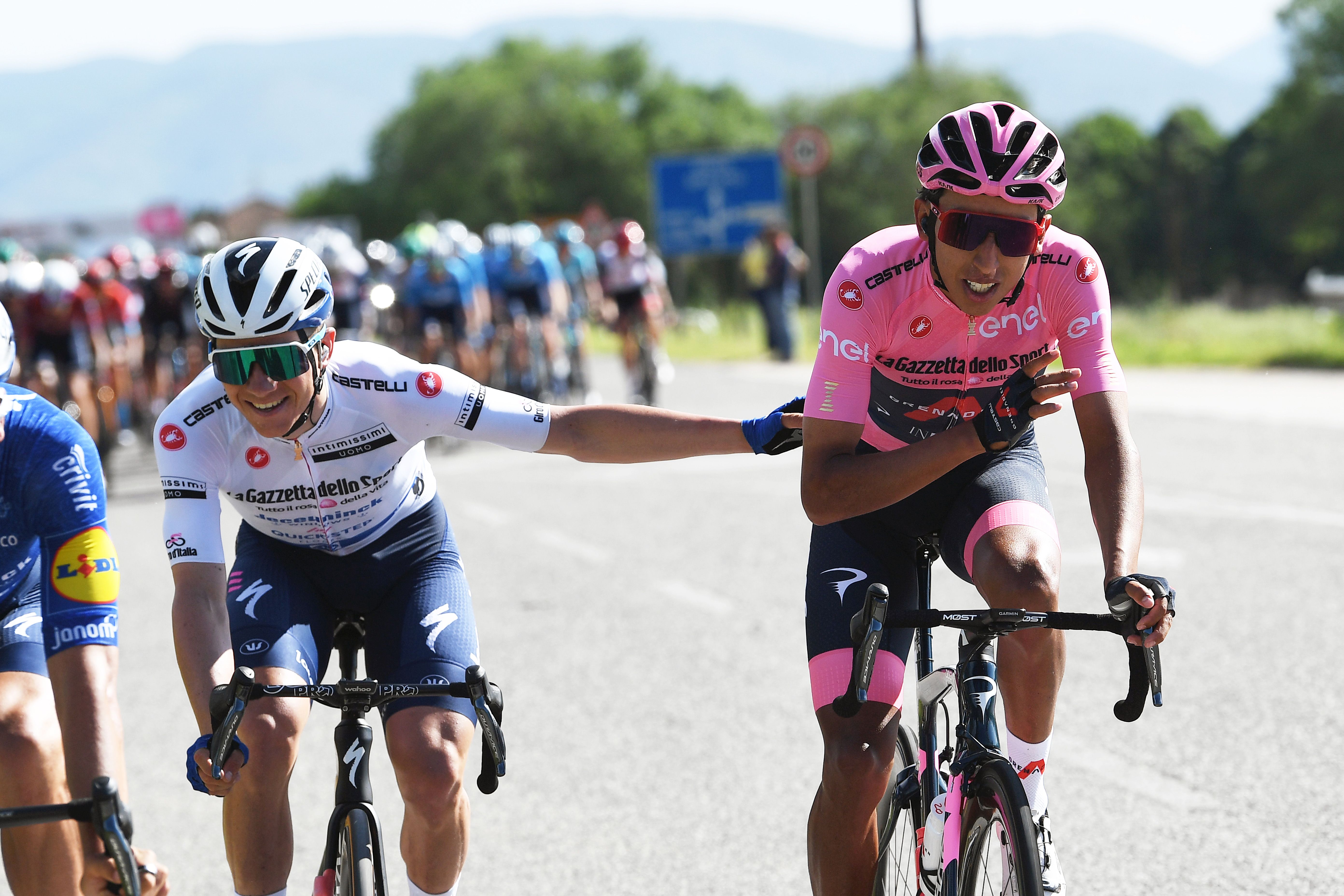 Remco Evenepoel and Egan Bernal in the white and pink jerseys, respectively.