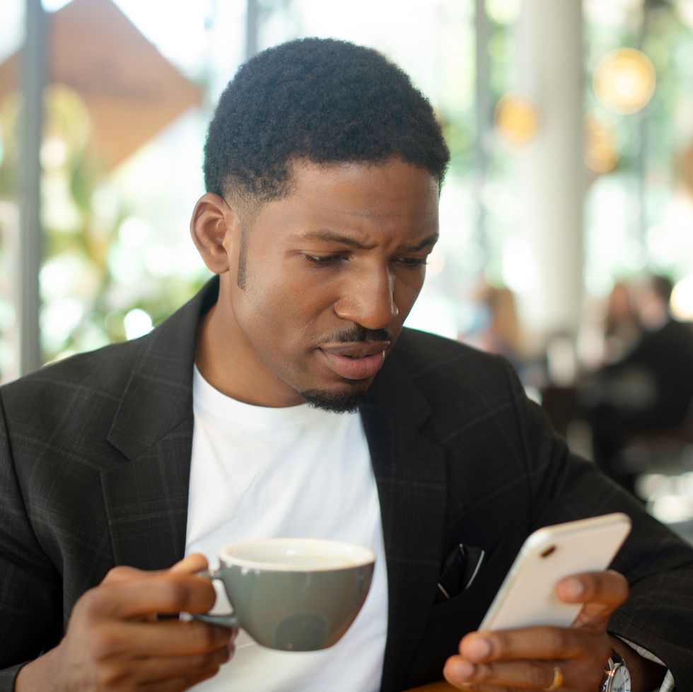 remote work, cafe and black man confused phone problem, alert or scam email notification freelance, coffee shop or african entrepreneur concerned by smartphone glitch, 404 or bad client feedback