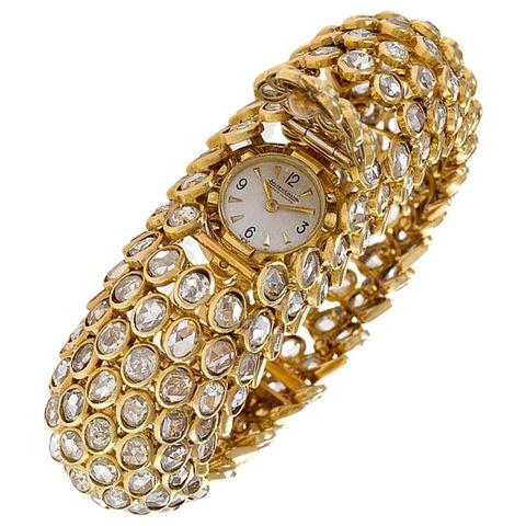 Bangle, Jewellery, Fashion accessory, Bracelet, Gold, Diamond, Metal, Gemstone, Chain, 