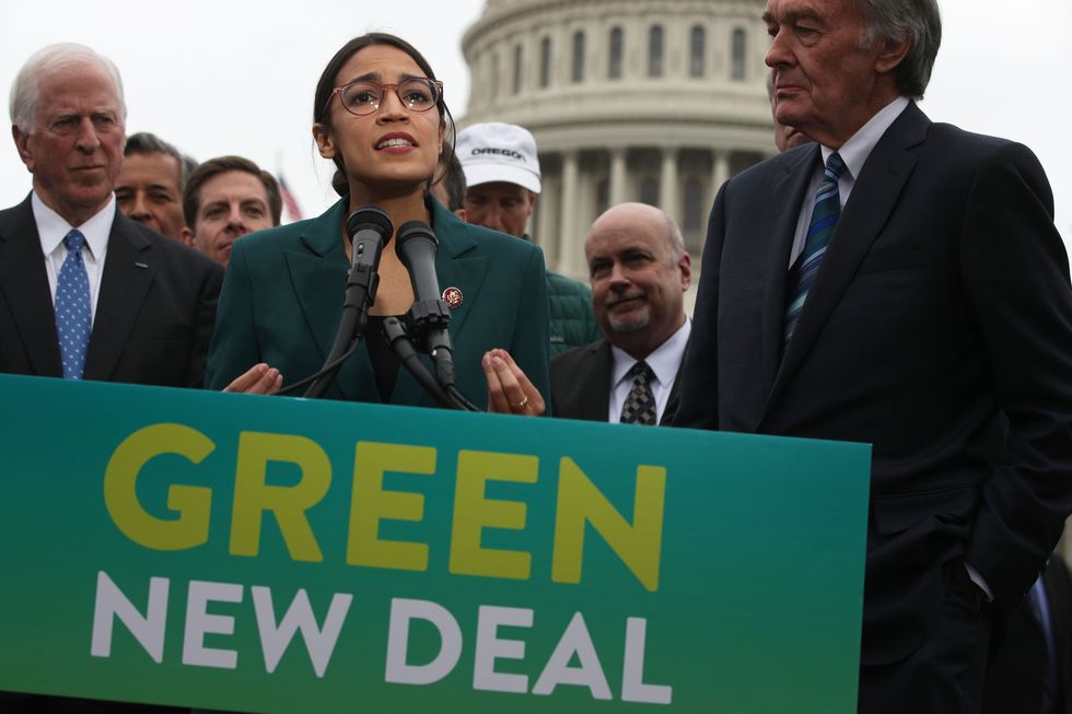 democratic lawmakers rep alexandria ocasio cortez and sen ed markey unveil their green new deal resolution