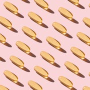 Repeated fish oil pills on pink background repeated fish oil pills on pink background