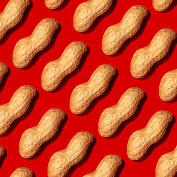 repeated nuts on the red background