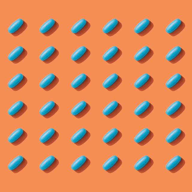 repeated pills on orange color background