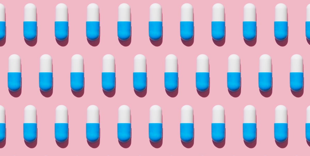 repeated pills on pink background