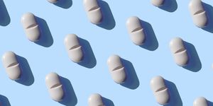repeated pills on the blue background