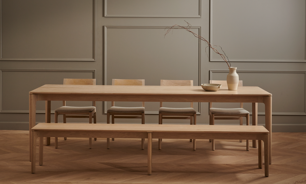 wooden dining table and chairs by kastella