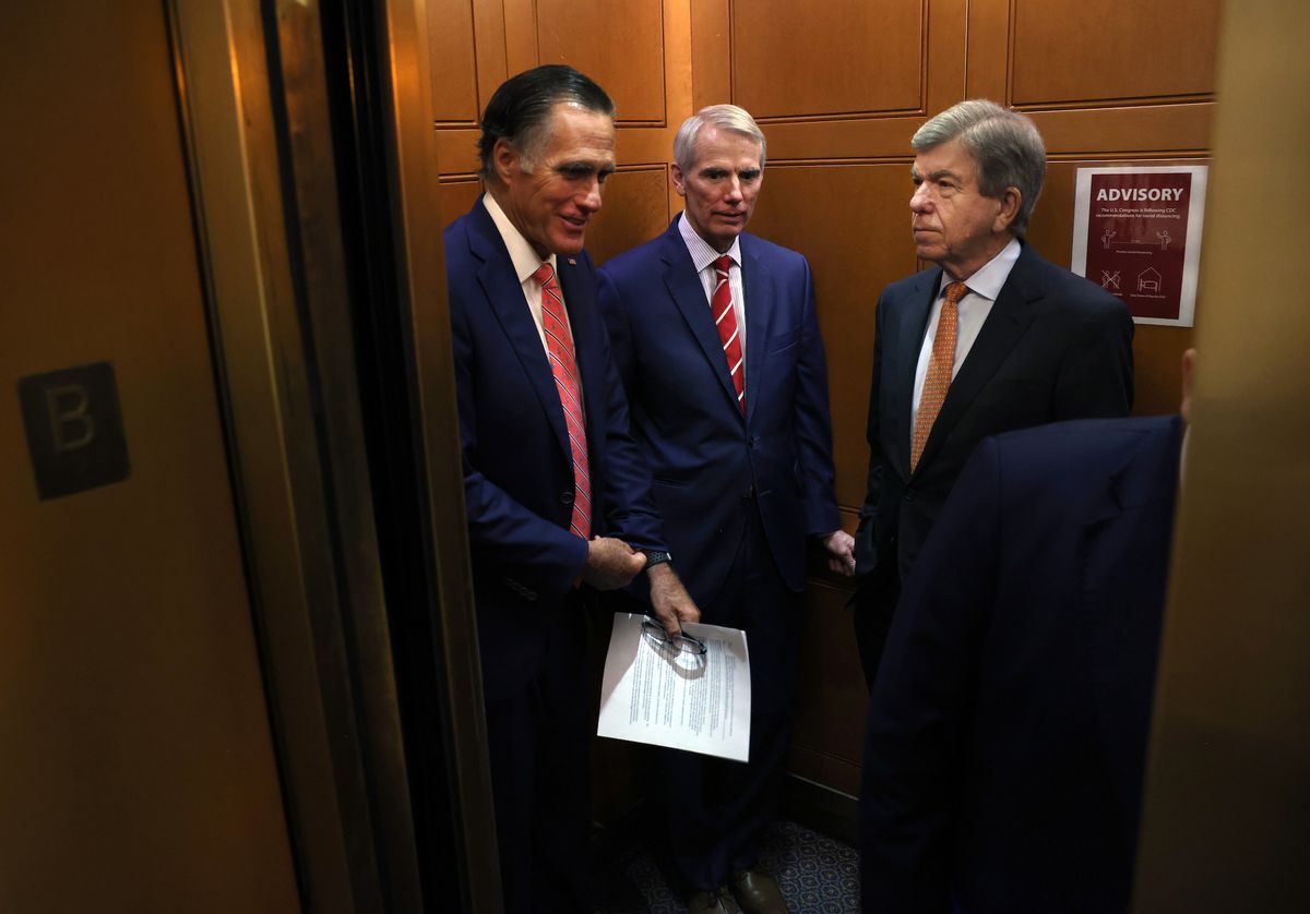 washington, dc   july 13 l r sen mitt romney r ut, sen rob portman r oh and sen roy blunt r mo ride an elevator as they leave a bipartisan meeting on infrastructure at the us capitol on july 13, 2021 in washington, dc the senate returned from a two week recess with hopes of passing a more than $1 trillion bipartisan infrastructure plan photo by kevin dietschgetty images