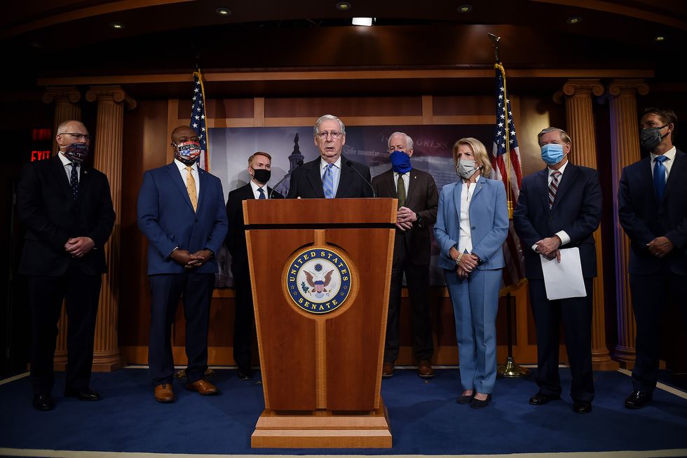 republican senate majority leader mitch mcconnellr ky flanked by other members of congress speaks during a news conference to announce that the senate is considering police reform legislation, at the us capitol on june 17, 2020 in washington, dc photo by olivier douliery  afp photo by olivier doulieryafp via getty images