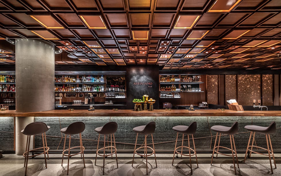 Building, Interior design, Bar, Furniture, Room, Architecture, Restaurant, Table, Ceiling, Bar stool, 