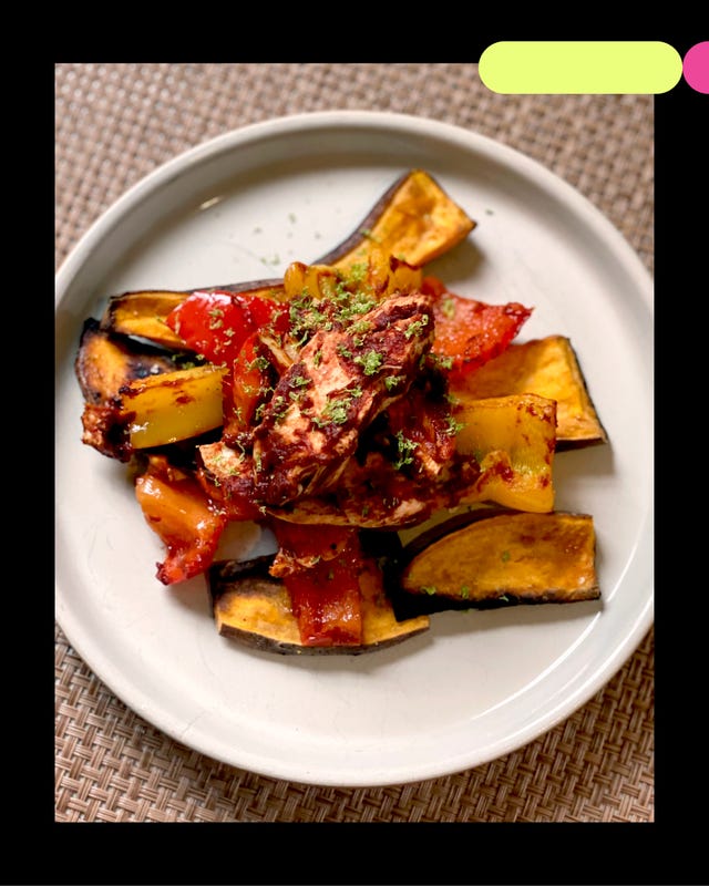grilled chicken served on a bed of roasted bell peppers and eggplant grilled chicken served on a bed of roasted bell peppers and eggplant