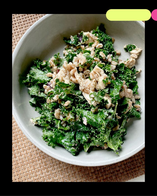 a bowl of kale salad with crunchy toppings a bowl of kale salad with crunchy toppings