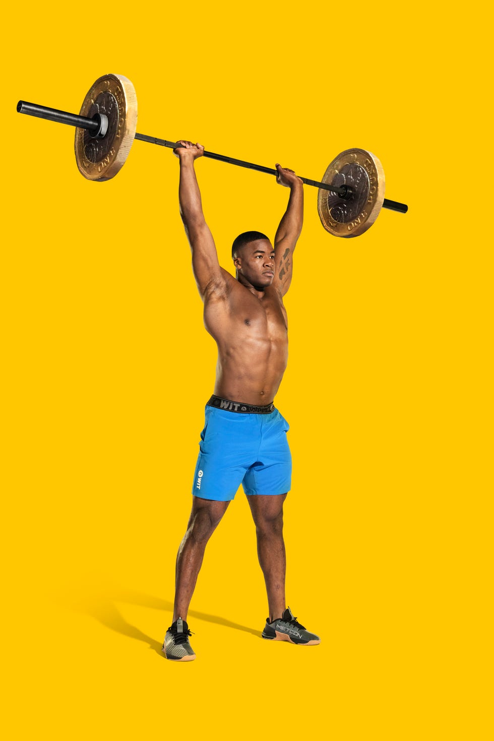 man with barbell