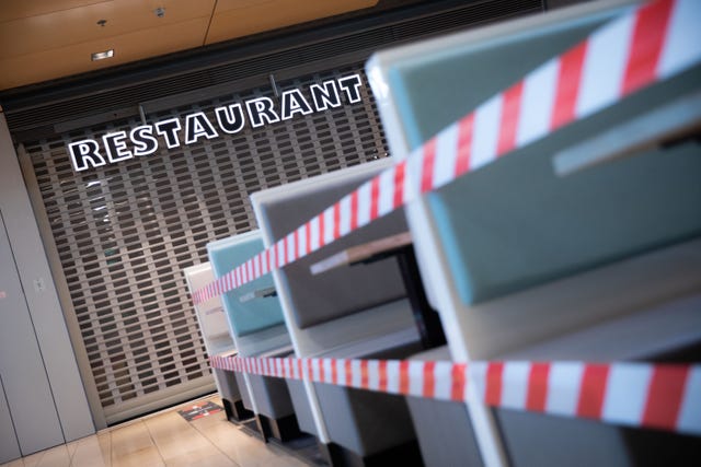 20 april 2020, hamburg a restaurant in the europa passage hamburg is still closed in the early morning, the seats in front of it are cordoned off with flutterband numerous retail shops up to 800 square meters are allowed to open again as of today photo christian charisiusdpa photo by christian charisiuspicture alliance via getty images