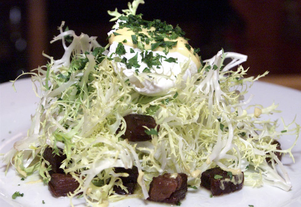 restaurant review of father's office in santa monica pic shows the dish frisee aux lardons, a sala