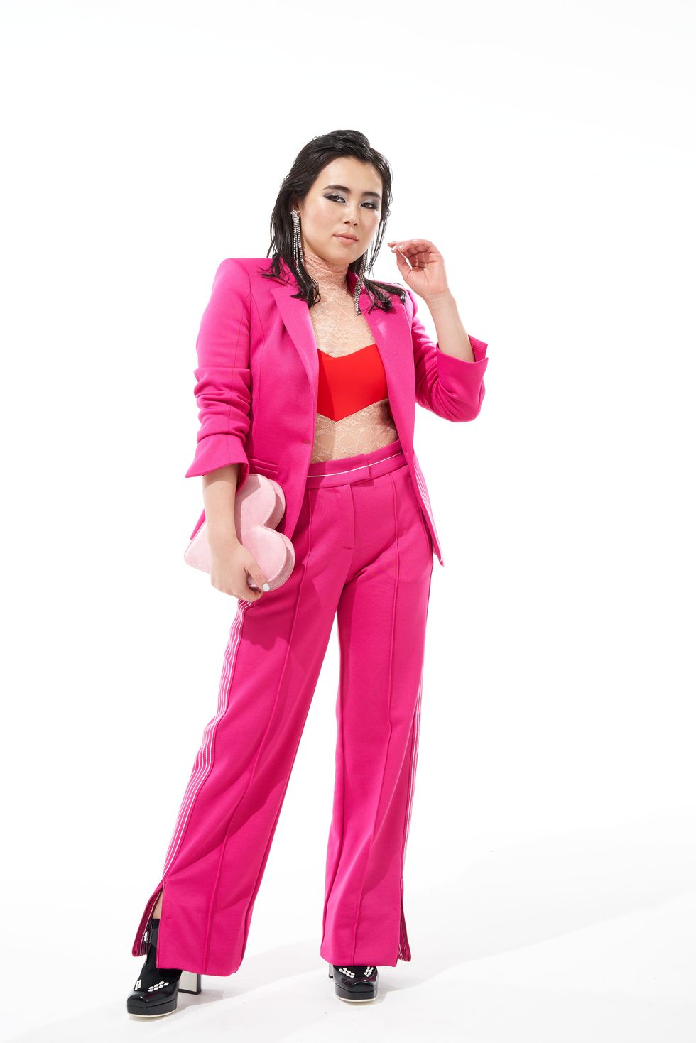 Clothing, Pink, Magenta, Suit, Formal wear, Outerwear, Pantsuit, Photography, Trousers, Fashion model, 