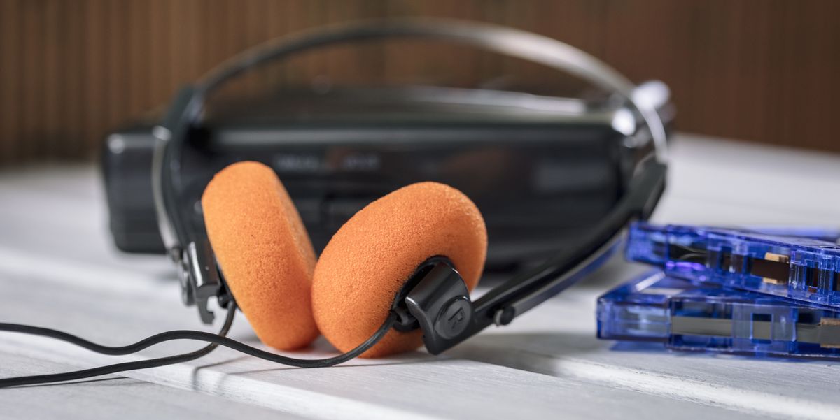 retro walkman headphones with orange pads, cassette music player 80s