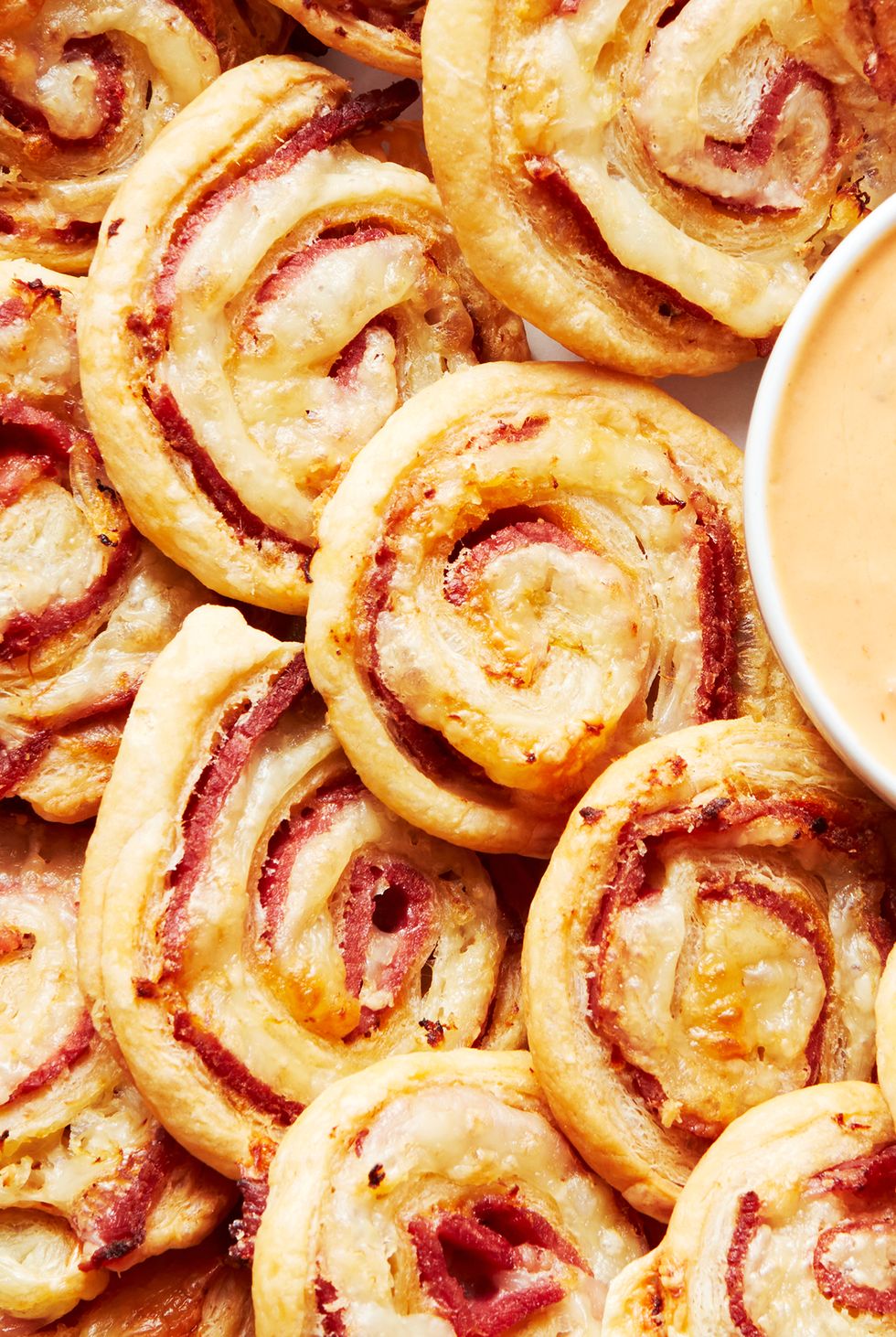 swirled corned beef and pastry pinwheels with russian dressing