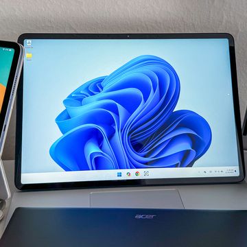 a group of touchscreen laptops