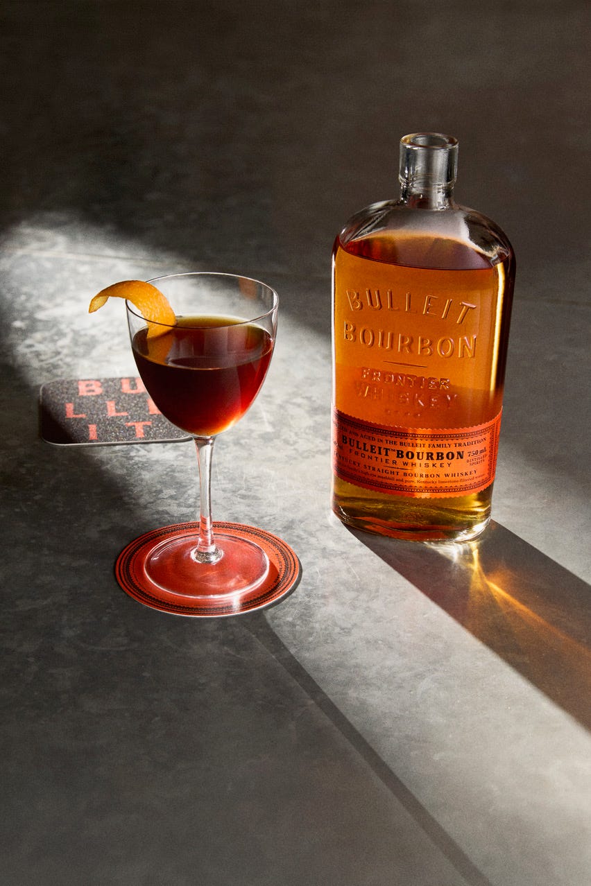 whiskey cocktail and bottle